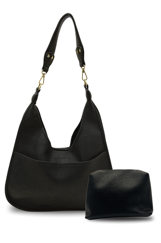A black Modern + Chic Clara Vegan Leather Slouchy Tote Bag for Women with coordinating removable zipper pouch on a white background.
