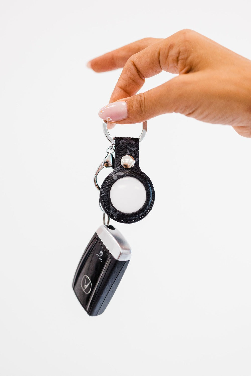 iman airtag keychain
