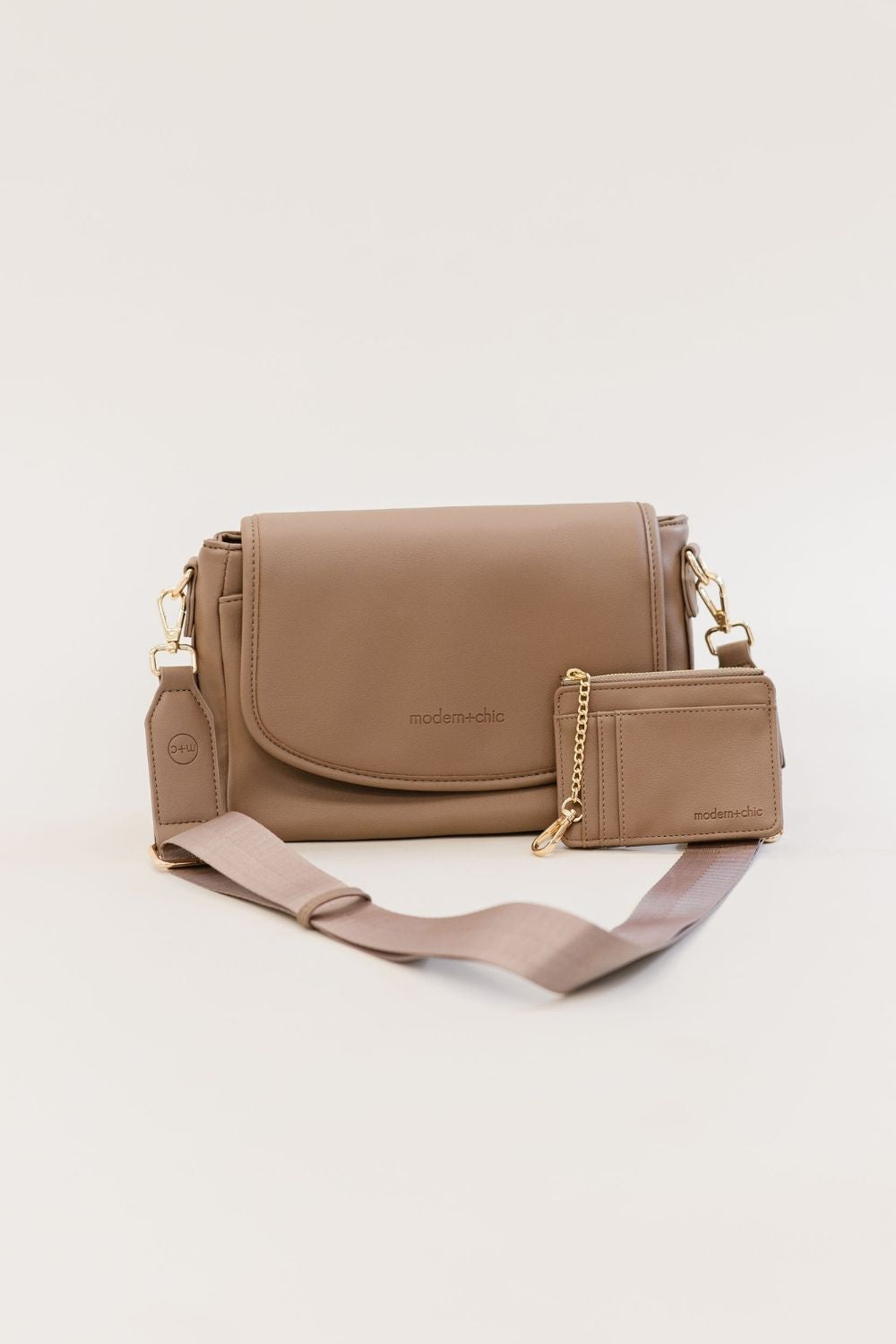 A taupe crossbody and matching wallet.