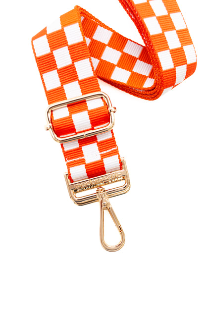 Red and white Modern + Chic Lizzie Checkered Purse Strap for Crossbody Bags on a white background.