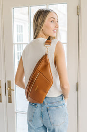 The oversized sling bag can also be worn on the back.