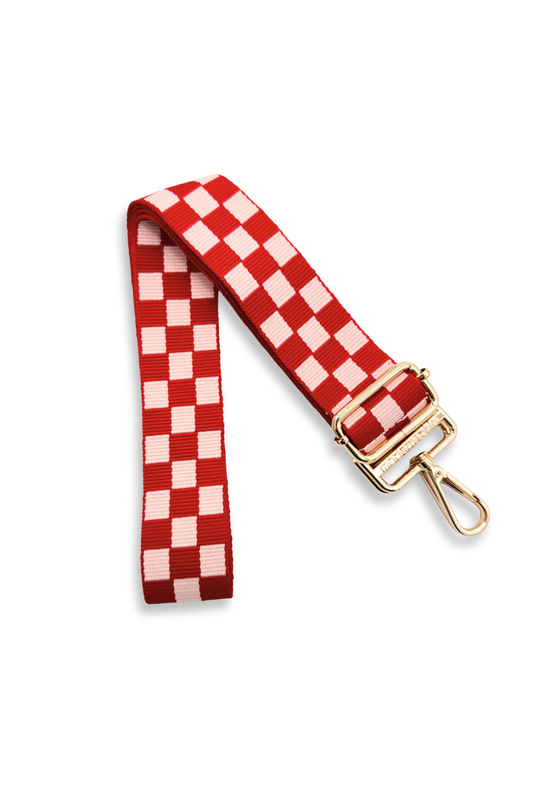Red and pink Modern + Chic Lizzie Checkered Purse Strap for Crossbody Bags on a white background.